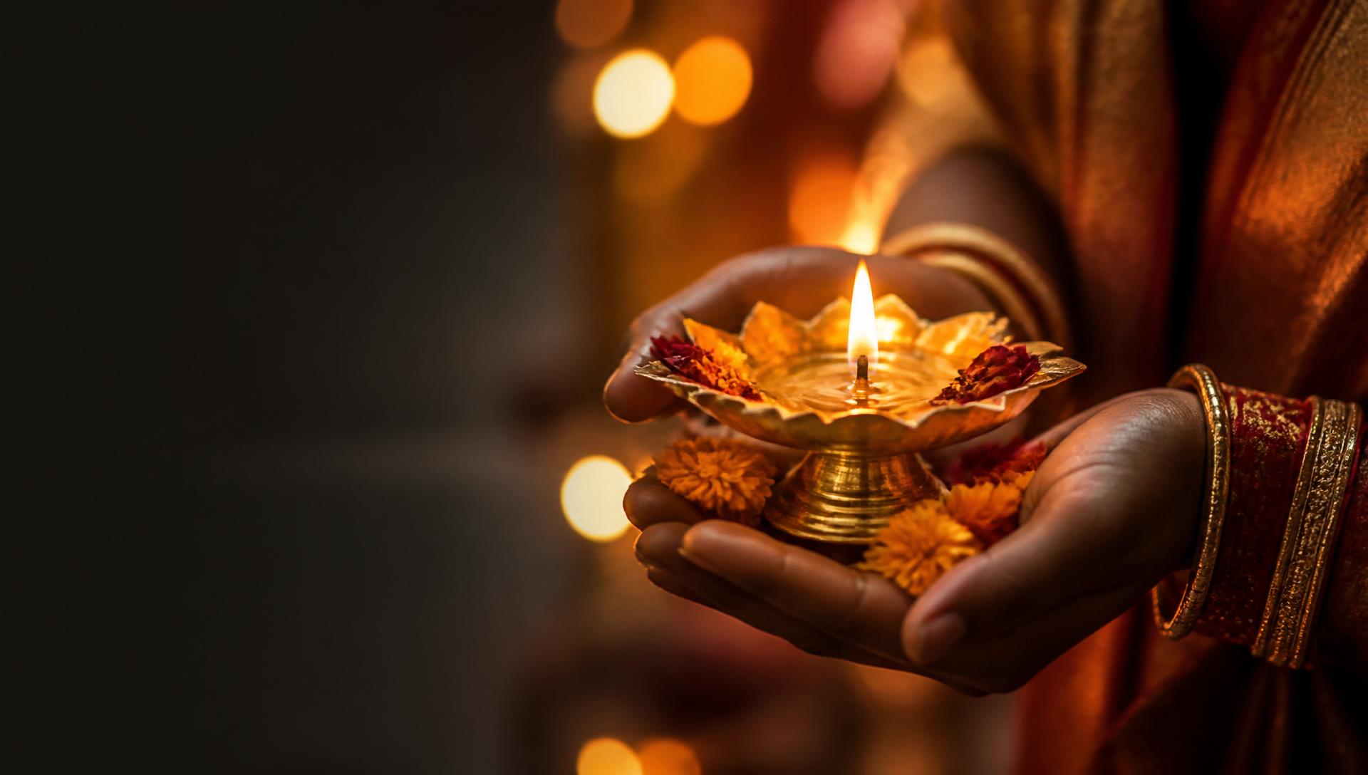 Devotee in prayer before a temple sanctum